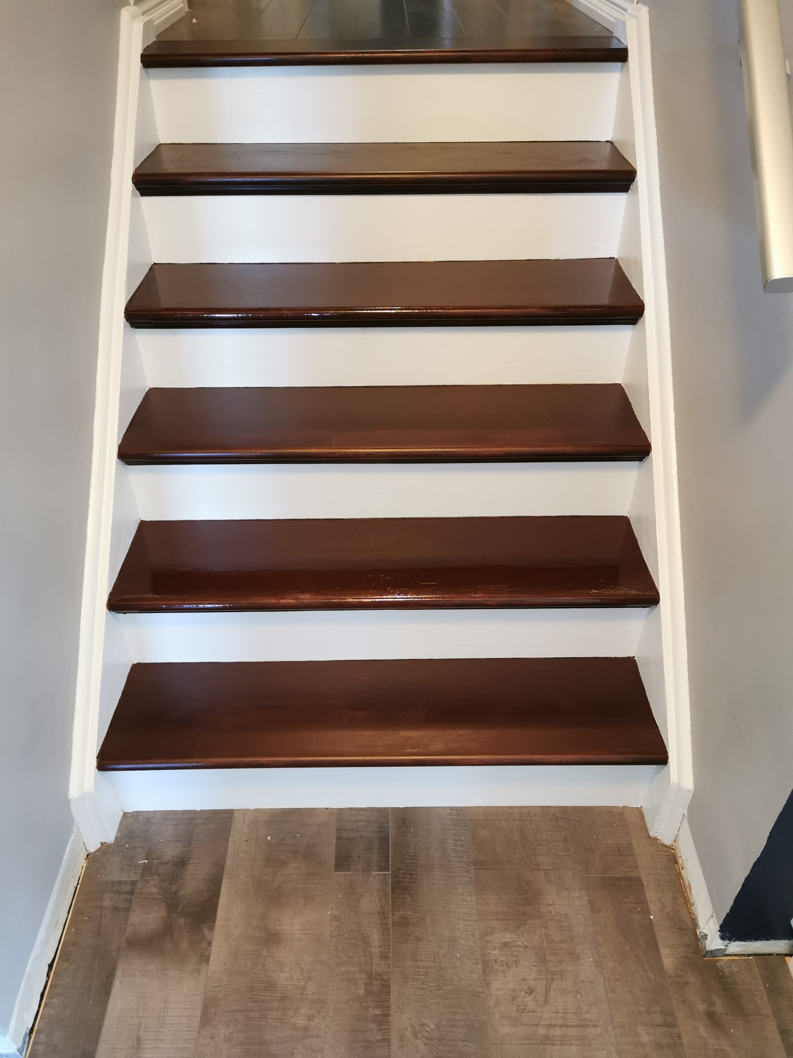 Here is an image of a flooring or stair renovation.